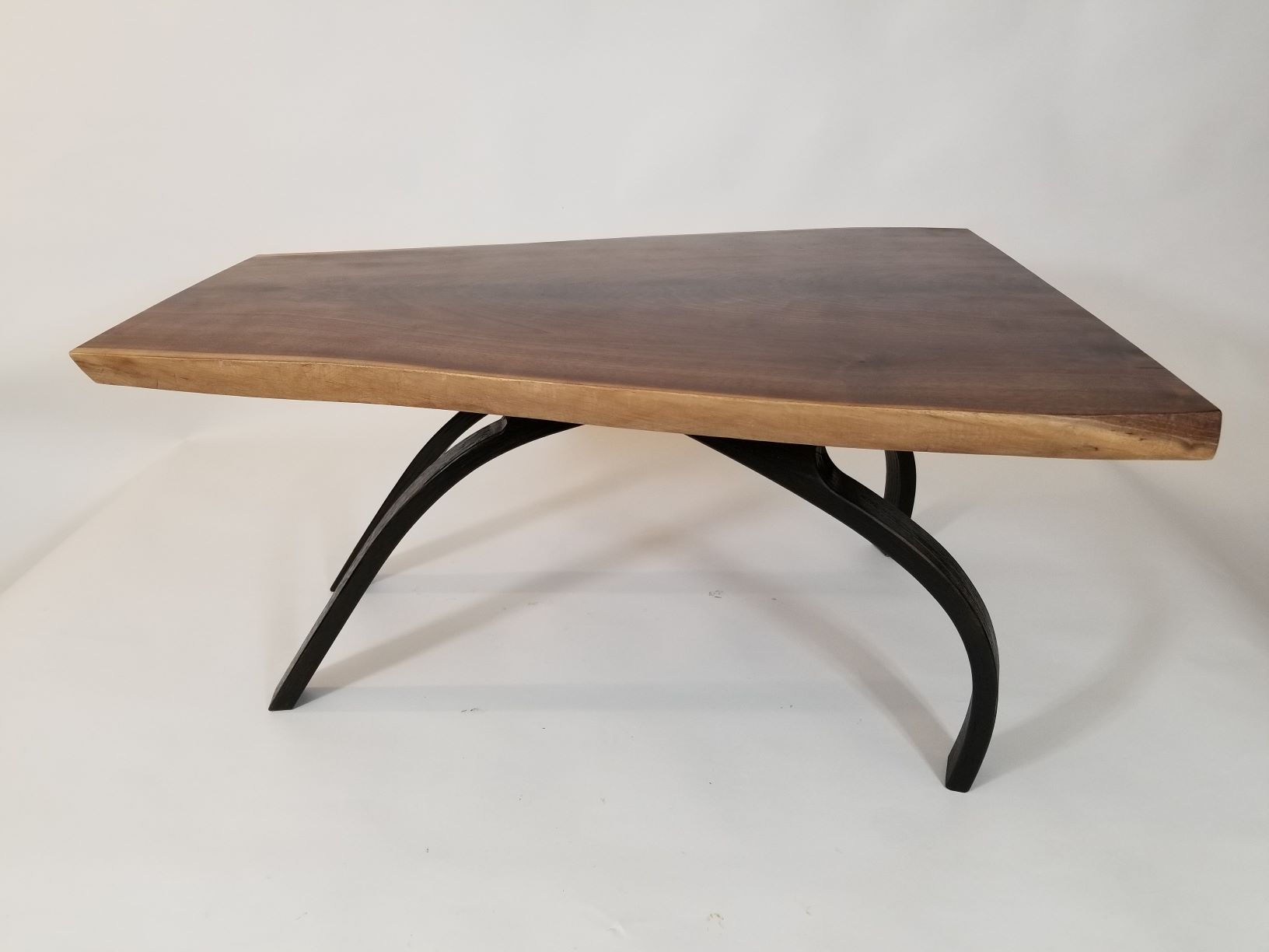 D101 Laminated bent wood base with air dried walnut top. 16"tall,  32" wide, 27" deep. Shipping paid by buyer.